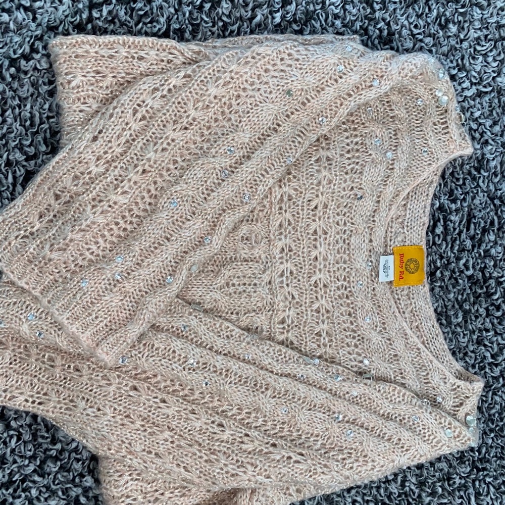 Pink knitted sweater